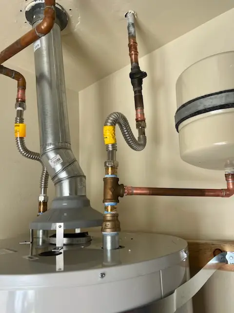 Water heater installation and plumbing repair in Scott